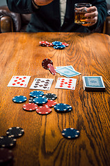 Image showing The chips for gamblings, drink and playing cards