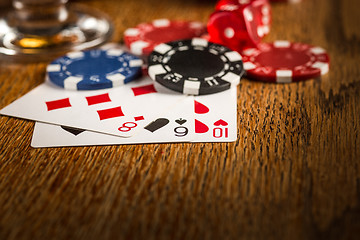 Image showing Cigar, chips for gamblings, drink and playing cards