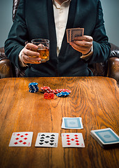 Image showing The chips for gamblings, drink and playing cards