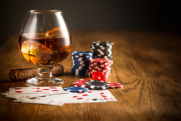 Image showing Cigar, chips for gamblings, drink and playing cards