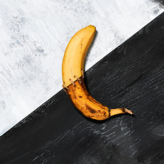 Image showing Single banana against blue background