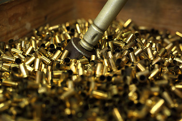 Image showing Ammunition, brass scales on the cartridges