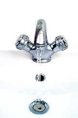 Image showing Tap and wash-basin