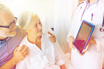 Image showing senior woman and doctor with tablet pc at hospital