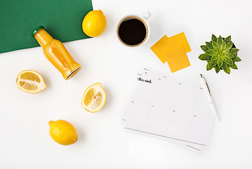 Image showing Top view of white office female workspace with notebook