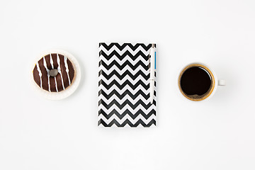 Image showing Top view of white office female workspace with notebook