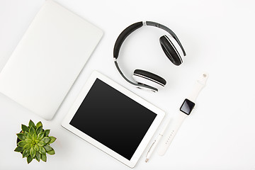 Image showing Top view of white office female workspace with laptop