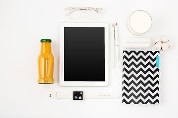 Image showing Top view of white office table with laptop