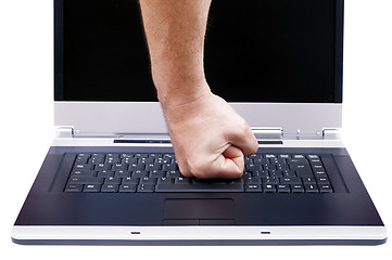 Image showing Laptop and fist