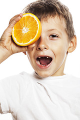 Image showing little cute boy with orange fruit double isolated on white smili