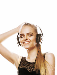 Image showing young sweet talented teenage girl in headphones singing isolated