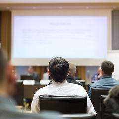 Image showing Audience in lecture hall participating at business conference.