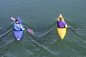 Image showing Two rowers with canoe recreate in a lake