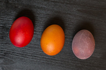 Image showing Easter eggs on wooden background.