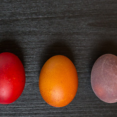 Image showing Easter eggs on wooden background.