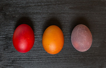 Image showing Easter eggs on wooden background.