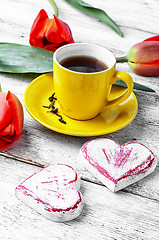 Image showing tea and bunch of tulips