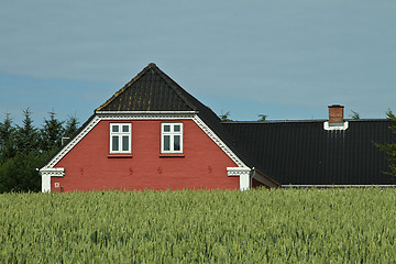 Image showing Red house in Danish landscapes in the summer