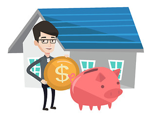 Image showing Man puts money into piggy bank for buying house.