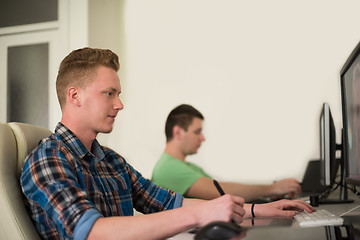 Image showing a group of graphic designers at work