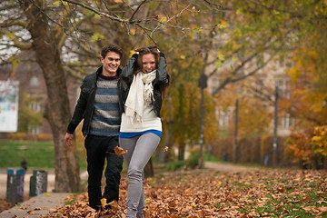 Image showing Happy young Couple in Autumn Park