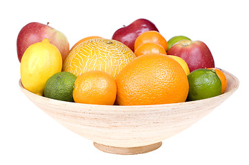 Image showing Fresh fruits on wooden bowl isolated