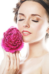 Image showing young beauty woman with flower peony pink closeup makeup soft te