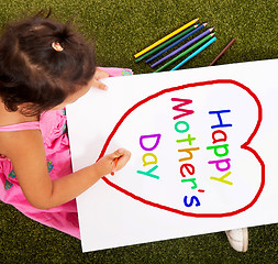 Image showing Kid Writing Happy Mother\'s Day Sign