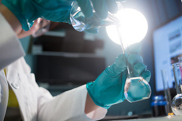 Image showing Lab technician in rubber gloves