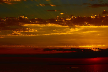 Image showing Sunrise in the sea with soft wave and cloudy