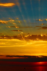 Image showing good red sunset over darken sea