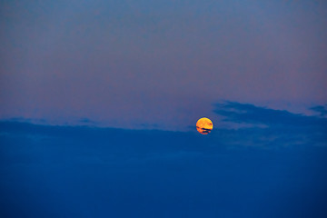 Image showing Full moon at sunset