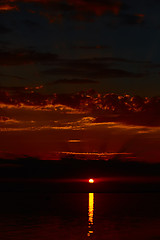 Image showing Sunrise in the sea with soft wave and cloudy