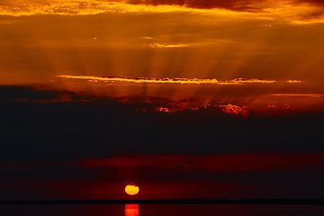 Image showing Sunrise in the sea with soft wave and cloudy