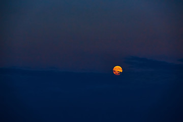 Image showing Full moon at sunset