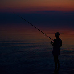 Image showing Fishing Silhouette on dramatic sky and sea