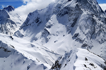 Image showing Winter mountains with snow cornice in nice sun day