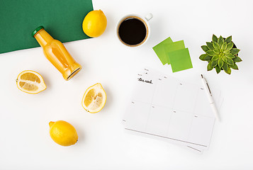 Image showing Top view of white office female workspace with notebook