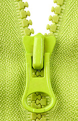 Image showing Closeup partially unbuttoned fastener