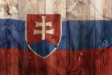 Image showing National flag of Slovakia, wooden background