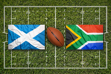 Image showing Scotland vs. South Africa flags on rugby field