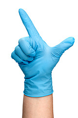 Image showing Hand in blue latex glove showing two fingers vertically