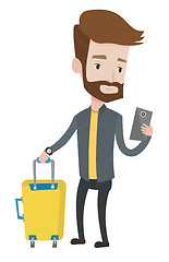 Image showing Traveller with suitcase using mobile phone.