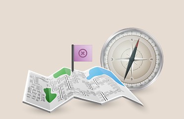 Image showing folded paper map with pointer flag and compass