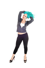 Image showing Woman standing with blue hair.