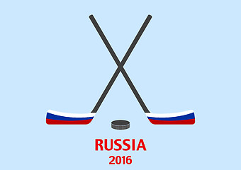 Image showing Hockey sticks and puck with the Russian flag