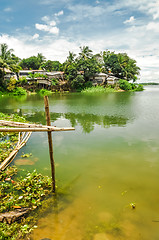 Image showing Houses by river