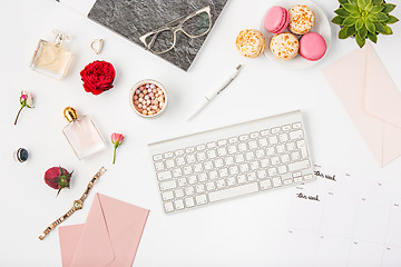 Image showing Top view of white office female workspace with pc