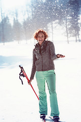 Image showing She's having fun in the snow