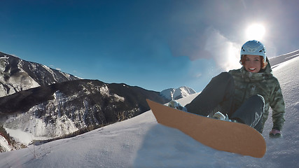 Image showing snowboarding woman